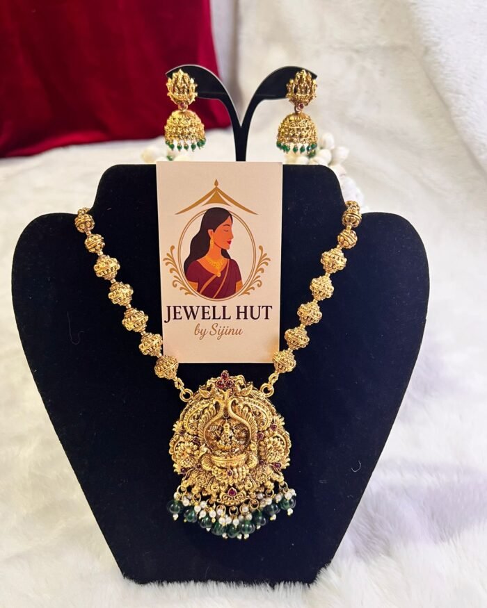 Heavy Devi Pendant Mala With Matching Jhumkas Temple Jewellery Designs With Green Colour Beads