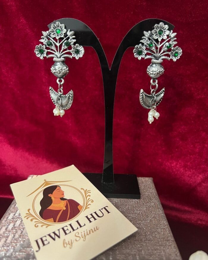 Oxidized hanging flowers with pearls.