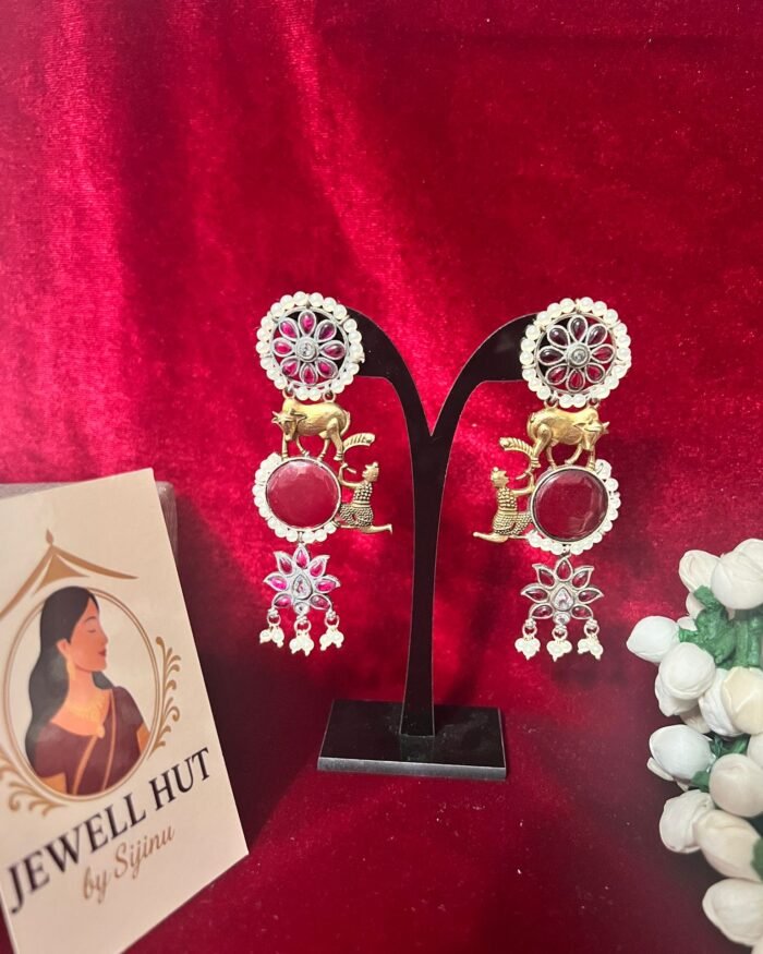 Oxidized hangings a red statement piece with animal motif and human figure with pearls